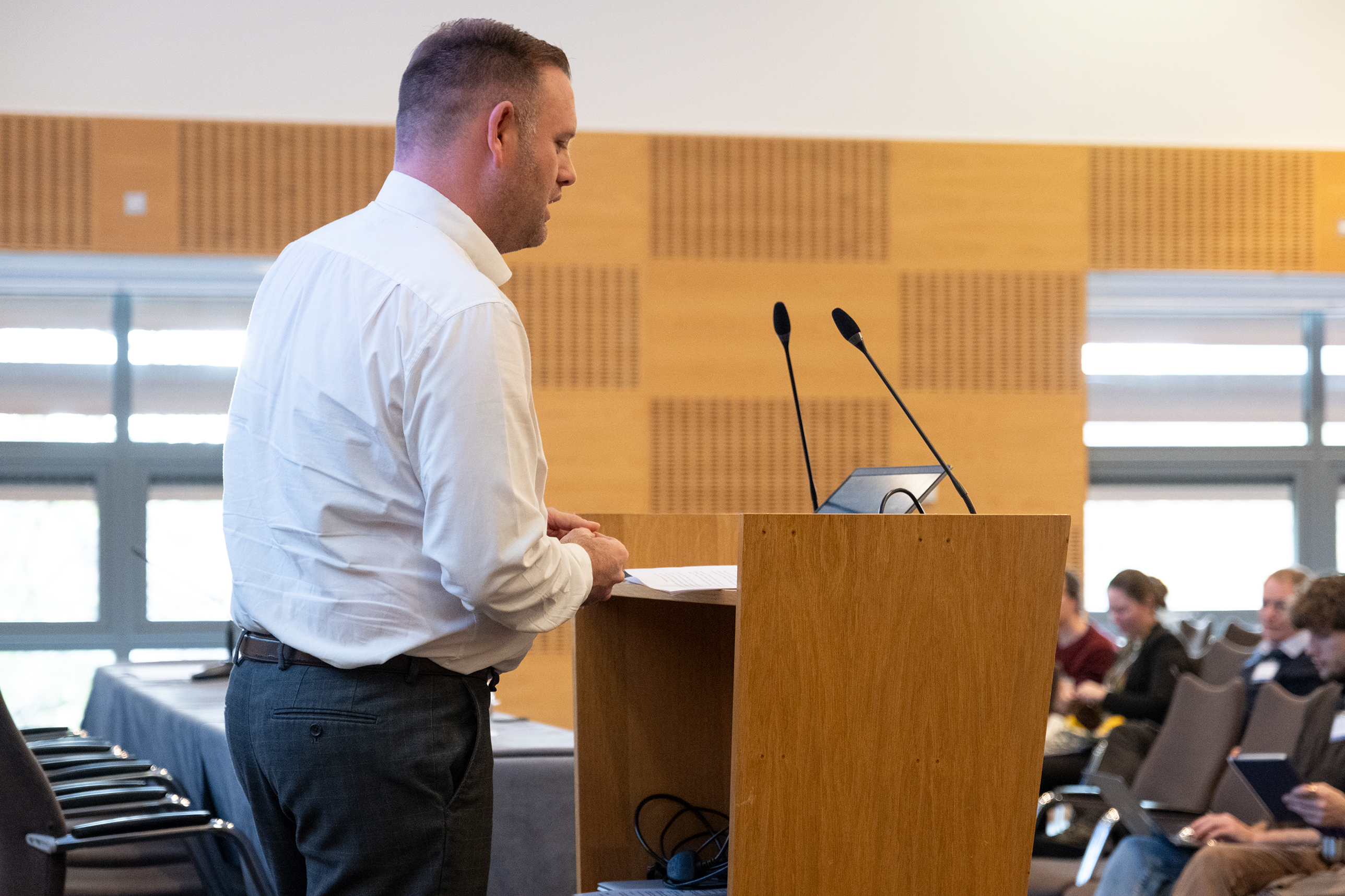 A person delivering a presentation at the EAUC Scotland conference 2024